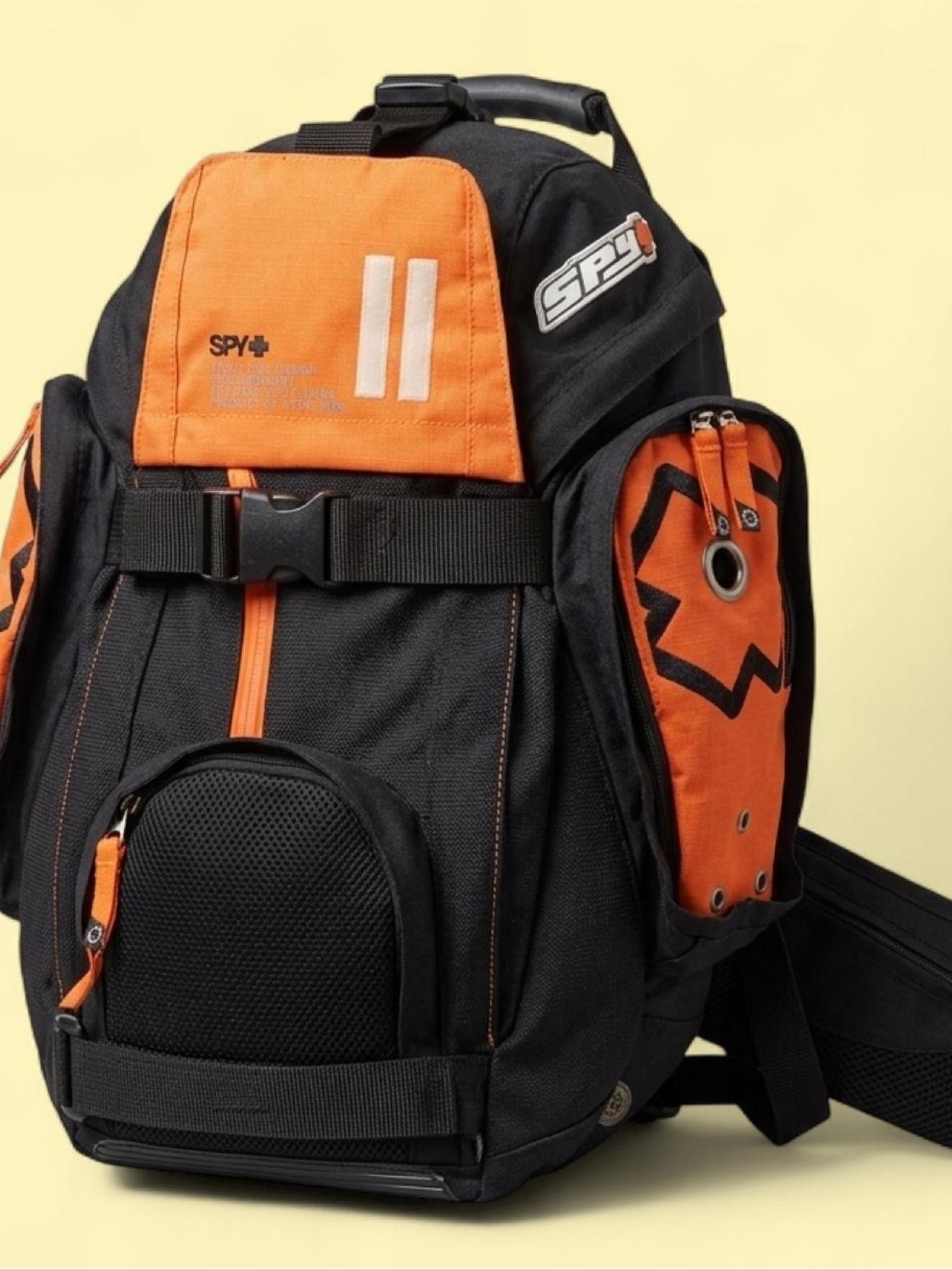Y2K Spy snowboard / skateboard orange/black backpack